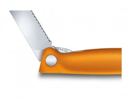 Zöldséghámozó zárókés Victorinox hullámos élű Narancssárga